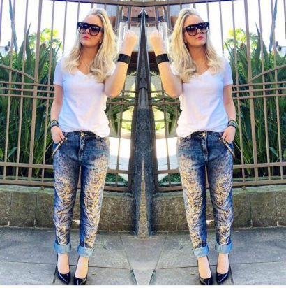 calça jeans estampada com rasgos