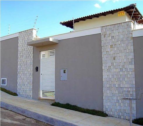 muro residencial decorado com pedras